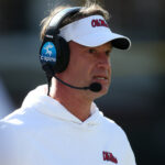 Nov 28, 2025; Starkville, Mississippi, USA; Mississippi Rebels head coach Lane Kiffin looks on in the first half against the Mississippi State Bulldogs at Davis Wade Stadium at Scott Field. Mandatory Credit: Petre Thomas-Imagn Images
