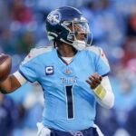NFL Draft 2026 Tennessee Titans quarterback Cam Ward (1) looks downfield during the fourth quarter against the Jacksonville Jaguars at Nissan Stadium in Nashville, Tenn., Sunday, Nov. 30, 2025.