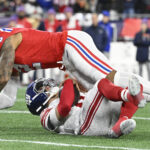 Dec 1, 2025; Foxborough, Massachusetts, USA; New England Patriots linebacker Harold Landry III (2) sacks New York Giants quarterback Jaxson Dart (6) during the first quarter at Gillette Stadium. Mandatory Credit: Eric Canha-Imagn Images