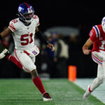 Dec 1, 2025; Foxborough, Massachusetts, USA; New England Patriots quarterback Drake Maye (10) runs the ball against New York Giants linebacker Abdul Carter (51) during the third quarter at Gillette Stadium. Mandatory Credit: David Butler II-Imagn Images