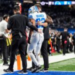 Detroit Lions safety Brian Branch (32) with help of Lions staff, walk off the field due to an injury during the second half against Dallas Cowboys at Ford Field in Detroit on Thursday, Dec. 4, 2025.