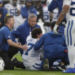 Dec 7, 2025; Jacksonville, Florida, USA; Indianapolis Colts quarterback Daniel Jones (17) is tended to by trainers after going down with an apparent injury against the Jacksonville Jaguars during the first half at EverBank Stadium. Mandatory Credit: Travis Register-Imagn Images