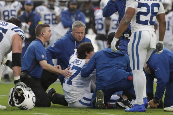 Dec 7, 2025; Jacksonville, Florida, USA; Indianapolis Colts quarterback Daniel Jones (17) is tended to by trainers after going down with an apparent injury against the Jacksonville Jaguars during the first half at EverBank Stadium. Mandatory Credit: Travis Register-Imagn Images