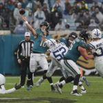Dec 7, 2025; Jacksonville, Florida, USA; Jacksonville Jaguars quarterback Trevor Lawrence (16) throws downfield against the Indianapolis Colts during the second half at EverBank Stadium. Mandatory Credit: Travis Register-Imagn Images