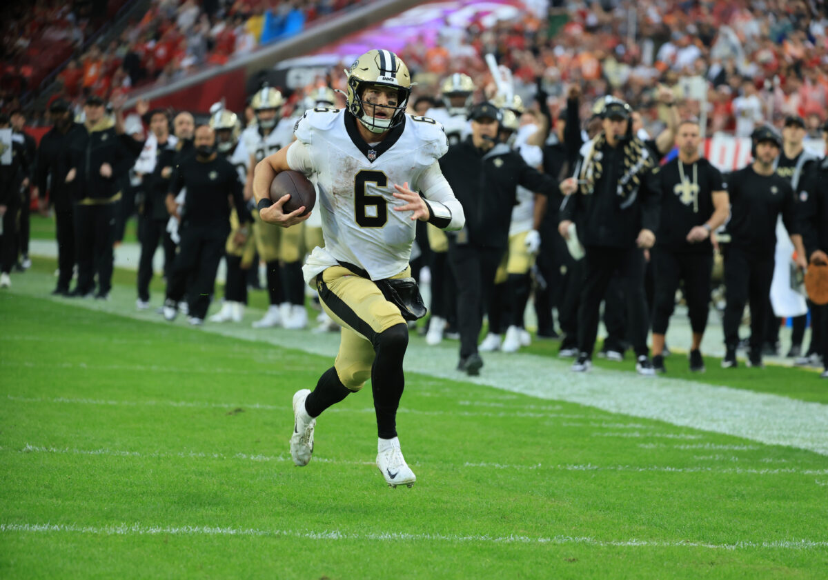 Dec 7, 2025; Tampa, Florida, USA; New Orleans Saints quarterback Tyler Shough (6) runs for a touchdown during the fourth quarter against the Tampa Bay Buccaneers at Raymond James Stadium. Mandatory Credit: Kim Klement Neitzel-Imagn Images