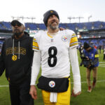 Dec 7, 2025; Baltimore, Maryland, USA; Pittsburgh Steelers head coach Mike Tomlin and quarterback Aaron Rodgers (8) walk off the field after the game against the Baltimore Ravens at M&T Bank Stadium. Mandatory Credit: Peter Casey-Imagn Images