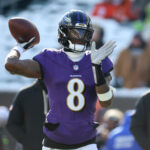 Dec 14, 2025; Cincinnati, Ohio, USA; Baltimore Ravens quarterback Lamar Jackson (8) warms up before the game against the Cincinnati Bengals at Paycor Stadium. Mandatory Credit: Joseph Maiorana-Imagn Images