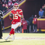 Dec 14, 2025; Kansas City, Missouri, USA; Kansas City Chiefs quarterback Patrick Mahomes (15) looks to pass against the Los Angeles Chargers during the first quarter at GEHA Field at Arrowhead Stadium. Mandatory Credit: Denny Medley-Imagn Images