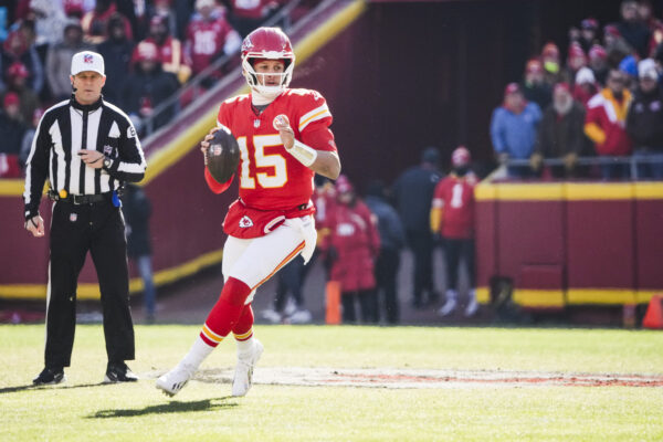 Dec 14, 2025; Kansas City, Missouri, USA; Kansas City Chiefs quarterback Patrick Mahomes (15) looks to pass against the Los Angeles Chargers during the first quarter at GEHA Field at Arrowhead Stadium. Mandatory Credit: Denny Medley-Imagn Images