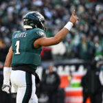 Dec 14, 2025; Philadelphia, Pennsylvania, USA; Philadelphia Eagles quarterback Jalen Hurts (1) reacts during the third quarter against the Las Vegas Raiders at Lincoln Financial Field. Mandatory Credit: Eric Hartline-Imagn Images