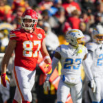 Dec 14, 2025; Kansas City, Missouri, USA; Kansas City Chiefs tight end Travis Kelce (87) reacts after catching a pass against the Los Angeles Chargers during the first quarter at GEHA Field at Arrowhead Stadium. Mandatory Credit: Jay Biggerstaff-Imagn Images