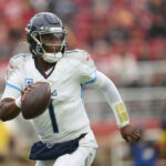 Dec 14, 2025; Santa Clara, California, USA; Tennessee Titans quarterback Cam Ward (1) looks to pass during the first quarter against the San Francisco 49ers at Levi's Stadium. Mandatory Credit: Cary Edmondson-Imagn Images