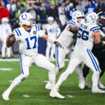 Dec 14, 2025; Seattle, Washington, USA; Indianapolis Colts quarterback Philip Rivers (17) passes against the Seattle Seahawks during the fourth quarter at Lumen Field. Mandatory Credit: Steven Bisig-Imagn Images