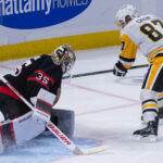 Dec 18, 2025; Ottawa, Ontario, CAN; Ottawa Senators goalie Linus Ullmark (35) makes a save on a shot from Pittsburgh Penguins center Sidney Crosby (97) in the third period at the Canadian Tire Centre. Mandatory Credit: Marc DesRosiers-IMAGN Images