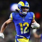 Dec 18, 2025; Seattle, Washington, USA; Los Angeles Rams wide receiver Puka Nacua (12) runs for a touchdown against the Seattle Seahawks in overtime at Lumen Field. Mandatory Credit: Kevin Ng-Imagn Images