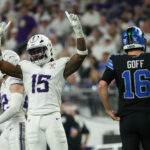 Dec 25, 2025; Minneapolis, Minnesota, USA; Minnesota Vikings linebacker Dallas Turner (15) celebrates after a play as Detroit Lions quarterback Jared Goff (16) reacts in the second half at U.S. Bank Stadium. Mandatory Credit: Matt Krohn-Imagn Images