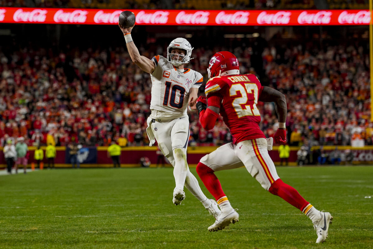 Dec 25, 2025; Kansas City, Missouri, USA; Denver Broncos quarterback Bo Nix (10) throws a toucdown pass during the fourth quarter at GEHA Field at Arrowhead Stadium. Mandatory Credit: Jay Biggerstaff-Imagn Images