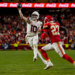 Dec 25, 2025; Kansas City, Missouri, USA; Denver Broncos quarterback Bo Nix (10) throws a toucdown pass during the fourth quarter at GEHA Field at Arrowhead Stadium. Mandatory Credit: Jay Biggerstaff-Imagn Images