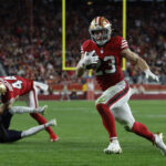 Dec 28, 2025; Santa Clara, California, USA; San Francisco 49ers running back Christian McCaffrey (23) runs for a touchdown against the Chicago Bears in the first half at Levi's Stadium. Mandatory Credit: Sergio Estrada-Imagn Images