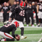 Dec 29, 2025; Atlanta, Georgia, USA; Atlanta Falcons place kicker Zane Gonzalez (45) kicks the go-ahead field goal against the Los Angeles Rams in the fourth quarter at Mercedes-Benz Stadium. Mandatory Credit: Brett Davis-Imagn Images