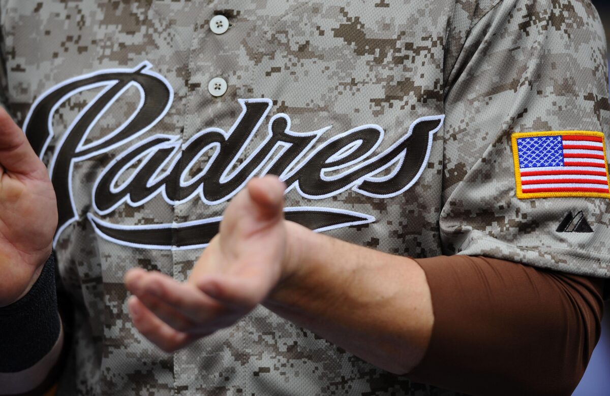 Sung-Mun Song Apr 14, 2013; San Diego, CA, USA; Detailed view of a special Military Day jersey worn by San Diego Padres catcher John Baker (8) prior to the game against the Colorado Rockies at Petco Park. . Mandatory Credit: Christopher Hanewinckel-USA TODAY Sports