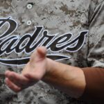 Sung-Mun Song Apr 14, 2013; San Diego, CA, USA; Detailed view of a special Military Day jersey worn by San Diego Padres catcher John Baker (8) prior to the game against the Colorado Rockies at Petco Park. . Mandatory Credit: Christopher Hanewinckel-USA TODAY Sports