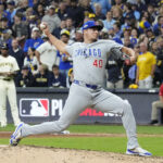 Oct 11, 2025; Milwaukee, Wisconsin, USA; Chicago Cubs pitcher Brad Keller (40) pitches against the Milwaukee Brewers in the eighth inning during game five of the NLDS round for the 2025 MLB playoffs at American Family Field.