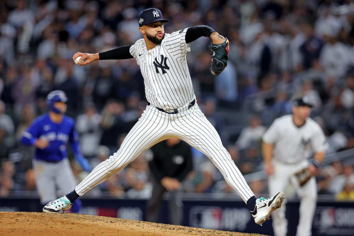 Oct 8, 2025; Bronx, New York, USA; New York Yankees pitcher Devin Williams (38) pitches during the seventh inning against the Toronto Blue Jays during game four of the ALDS round for the 2025 MLB playoffs at Yankee Stadium.