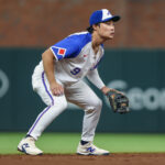 Sep 27, 2025; Cumberland, Georgia, USA; Atlanta Braves shortstop Ha-Seong Kim (9) waits for a hit in the game against the Pittsburgh Pirates during the third inning at Truist Park.