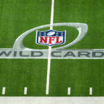 Playoffs da NFL Jan 17, 2022; Inglewood, California, USA; A NFL Wild Card playoff logo on the field at SoFi Stadium. Mandatory Credit: Kirby Lee-USA TODAY Sports