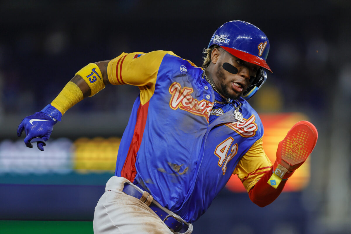 Mar 14, 2023; Miami, Florida, USA; Venezuela center fielder Ronald Acuna Jr. (42) runs toward home plate during the fourth inning against Nicaragua at LoanDepot Park. Mandatory Credit: Sam Navarro-USA TODAY Sports