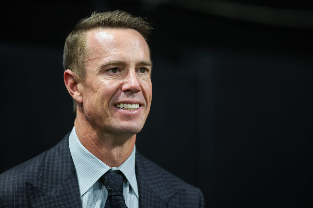 Oct 3, 2024; Atlanta, Georgia, USA; Former Atlanta Falcons quarterback Matt Ryan (2) on the sideline before being inducted in the team’s ring of honor at halftime of a game against the Tampa Bay Buccaneers at Mercedes-Benz Stadium. Mandatory Credit: Brett Davis-Imagn Images