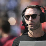 Oct 13, 2024; Baltimore, Maryland, USA; Washington Commanders offensive coordinator Kliff Kingsbury on the sidelines during the first half against the Baltimore Ravens at M&T Bank Stadium. Mandatory Credit: Tommy Gilligan-Imagn Images