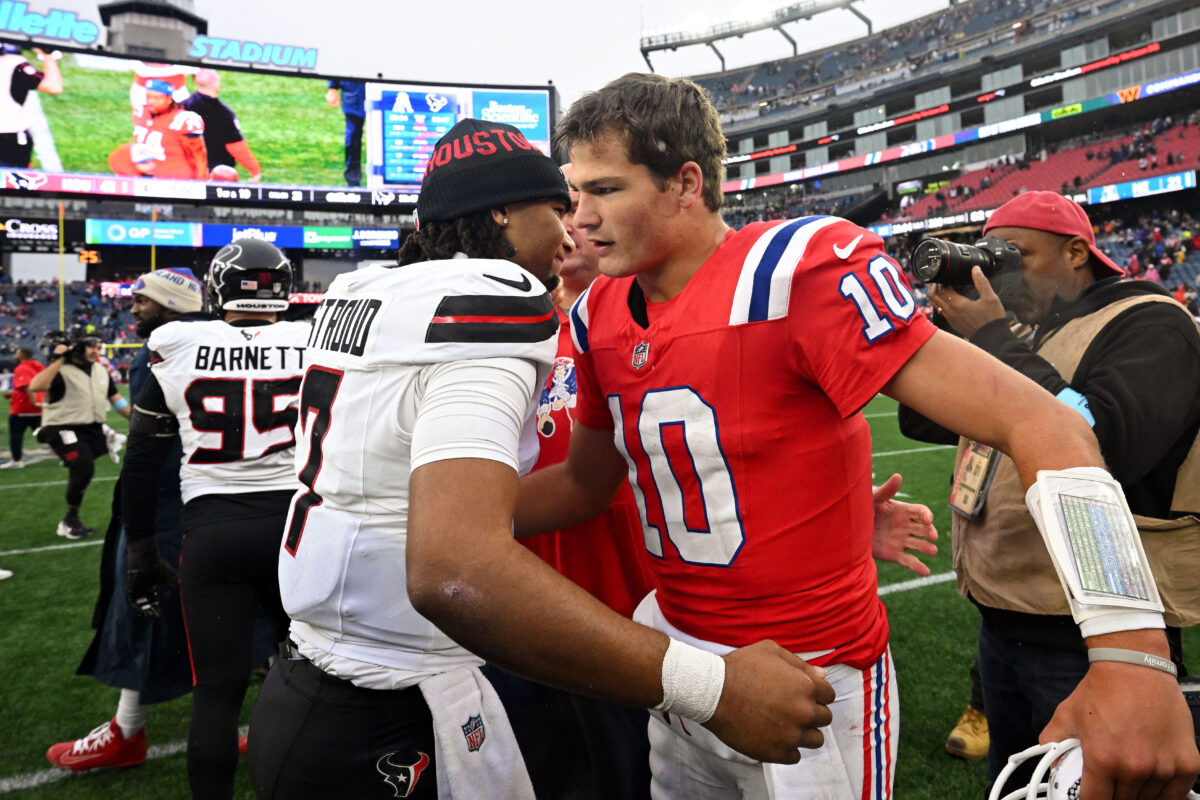 Oct 13, 2024; Foxborough, Massachusetts, USA; Houston Texans quarterback C.J. Stroud (7) hugs New England Patriots quarterback Drake Maye (10) after a game at Gillette Stadium. Mandatory Credit: Brian Fluharty-Imagn Images