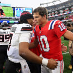 Oct 13, 2024; Foxborough, Massachusetts, USA; Houston Texans quarterback C.J. Stroud (7) hugs New England Patriots quarterback Drake Maye (10) after a game at Gillette Stadium. Mandatory Credit: Brian Fluharty-Imagn Images