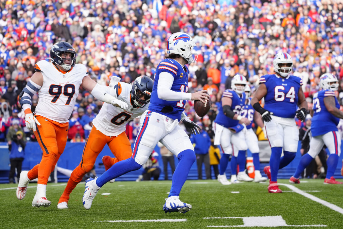 Jan 12, 2025; Orchard Park, New York, USA; Buffalo Bills quarterback Josh Allen (17) runs for a gain during the fourth quarter against the Denver Broncos in an AFC wild card game at Highmark Stadium. Mandatory Credit: Gregory Fisher-Imagn Images