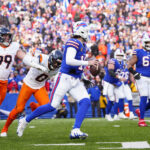Jan 12, 2025; Orchard Park, New York, USA; Buffalo Bills quarterback Josh Allen (17) runs for a gain during the fourth quarter against the Denver Broncos in an AFC wild card game at Highmark Stadium. Mandatory Credit: Gregory Fisher-Imagn Images