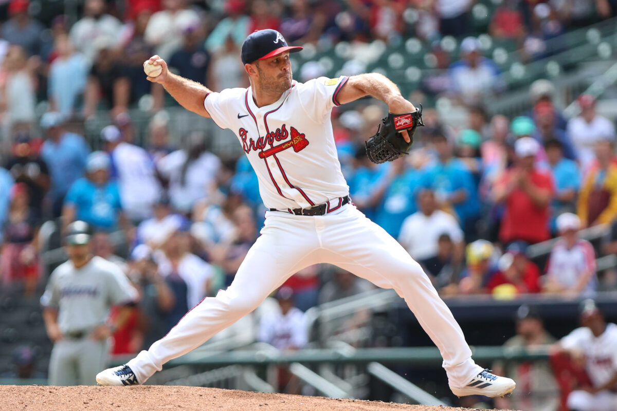 Aug 10, 2025; Cumberland, Georgia, USA; Atlanta Braves pitcher Tyler Kinley (45) pitches against the Miami Marlins during the ninth inning at Truist Park. Mandatory Credit: Jordan Godfree-Imagn Images