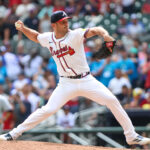 Aug 10, 2025; Cumberland, Georgia, USA; Atlanta Braves pitcher Tyler Kinley (45) pitches against the Miami Marlins during the ninth inning at Truist Park. Mandatory Credit: Jordan Godfree-Imagn Images