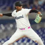 Aug 25, 2025; Miami, Florida, USA; Miami Marlins starting pitcher Edward Cabrera (27) pitches in the first inning against the Atlanta Braves at loanDepot Park. Mandatory Credit: Jim Rassol-Imagn Images