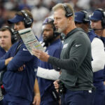 Sep 14, 2025; Arlington, Texas, USA; Dallas Cowboys defensive coordinator Matt Eberflus on the sideline during the first quarter at AT&T Stadium. Mandatory Credit: Raymond Carlin III-Imagn Images