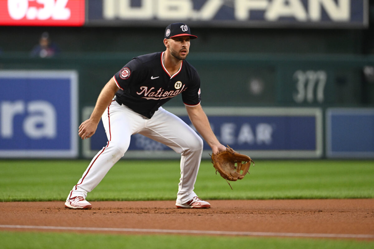 Sep 15, 2025; Washington, District of Columbia, USA; Washington Nationals third baseman Paul DeJong (14) in the field against the Atlanta Braves during the first inning at Nationals Park. Mandatory Credit: Brad Mills-Imagn Images