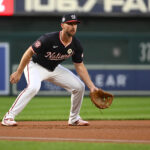 Sep 15, 2025; Washington, District of Columbia, USA; Washington Nationals third baseman Paul DeJong (14) in the field against the Atlanta Braves during the first inning at Nationals Park. Mandatory Credit: Brad Mills-Imagn Images