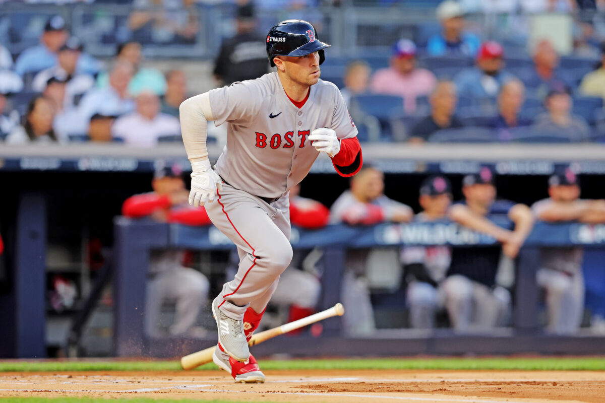 Sep 30, 2025; Bronx, New York, USA; Boston Red Sox third base Alex Bregman (2) hits a single during the first inning against the New York Yankees during game one of the Wildcard round for the 2025 MLB playoffs at Yankee Stadium. Mandatory Credit: Brad Penner-Imagn Images