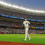 Sep 30, 2025; Bronx, New York, USA; New York Yankees outfielder Cody Bellinger (35) runs in after the top of third inning against the Boston Red Sox during game one of the Wildcard round for the 2025 MLB playoffs at Yankee Stadium. Mandatory Credit: Brad Penner-Imagn Images