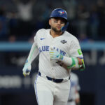 MLB Nov 1, 2025; Toronto, Ontario, CAN; Toronto Blue Jays shortstop Bo Bichette (11) rounds the bases after hitting a three run home run against the Los Angeles Dodgers in the third inning for game seven of the 2025 MLB World Series at Rogers Centre. Mandatory Credit: Nick Turchiaro-Imagn Images