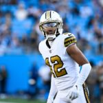 Nov 9, 2025; Charlotte, North Carolina, USA; New Orleans Saints wide receiver Chris Olave (12) looks on during the fourth quarter against the Carolina Panthers at Bank of America Stadium. Mandatory Credit: Bob Donnan-Imagn Images
