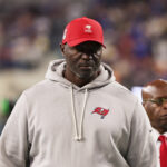 Nov 23, 2025; Inglewood, California, USA; Tampa Bay Buccaneers head coach and defensive coordinator Todd Bowles walks off the field during halftime against the Los Angeles Rams at SoFi Stadium. Mandatory Credit: Kiyoshi Mio-Imagn Images