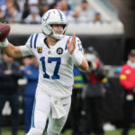 Dec 7, 2025; Jacksonville, Florida, USA; Indianapolis Colts quarterback Daniel Jones (17) looks to throw downfield against the Jacksonville Jaguars during the first half at EverBank Stadium. Mandatory Credit: Travis Register-Imagn Images