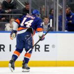 Dec 11, 2025; Elmont, New York, USA; New York Islanders center Bo Horvat (14) skates off the ice after a lower body injury during the second period against the Anaheim Ducks at UBS Arena.